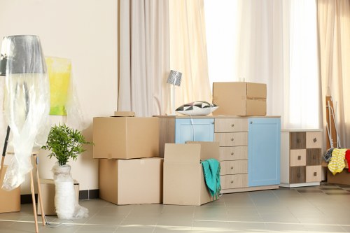 Removal team preparing a home move in Osterley