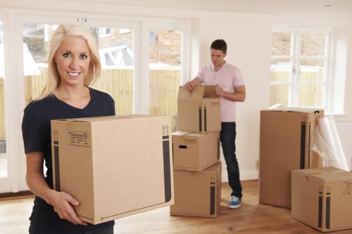 Man with van loading furniture in Osterley for a local move