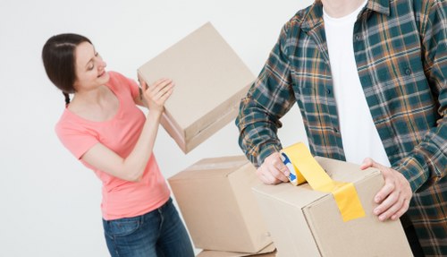 Local moving team handling fragile items near Osterley