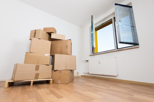 Removal team loading commercial items for transport in West London