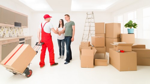 Local moving van helping with furniture and boxes in Osterley