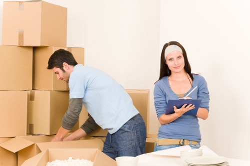 Packed moving boxes ready for transport in Osterley
