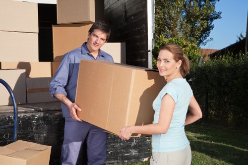 Packed office equipment and furniture ready for a business move